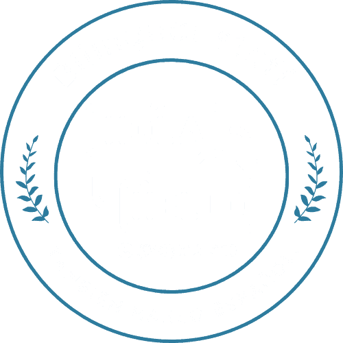 A circular badge with the words Bilingual staff at the top and También hablo español at the bottom. In the center, speech bubbles say HOLA and HELLO, with a phone number: (940) 312-7110.
